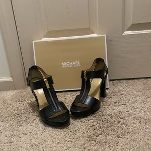Used Michael Kors block heels w/zipper. Great condition